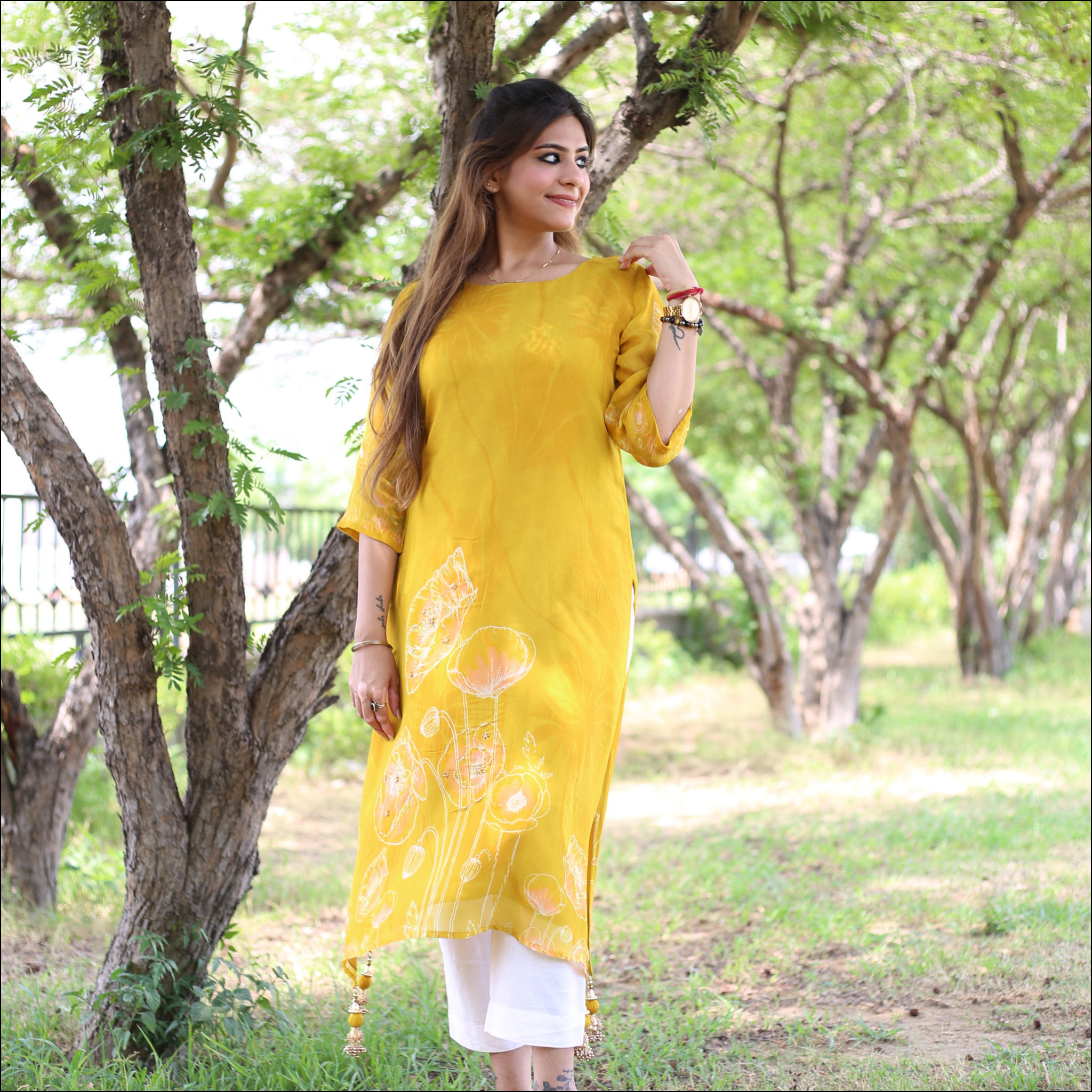 Yellow Organza Kurti with Handwork & Tassel Detailing