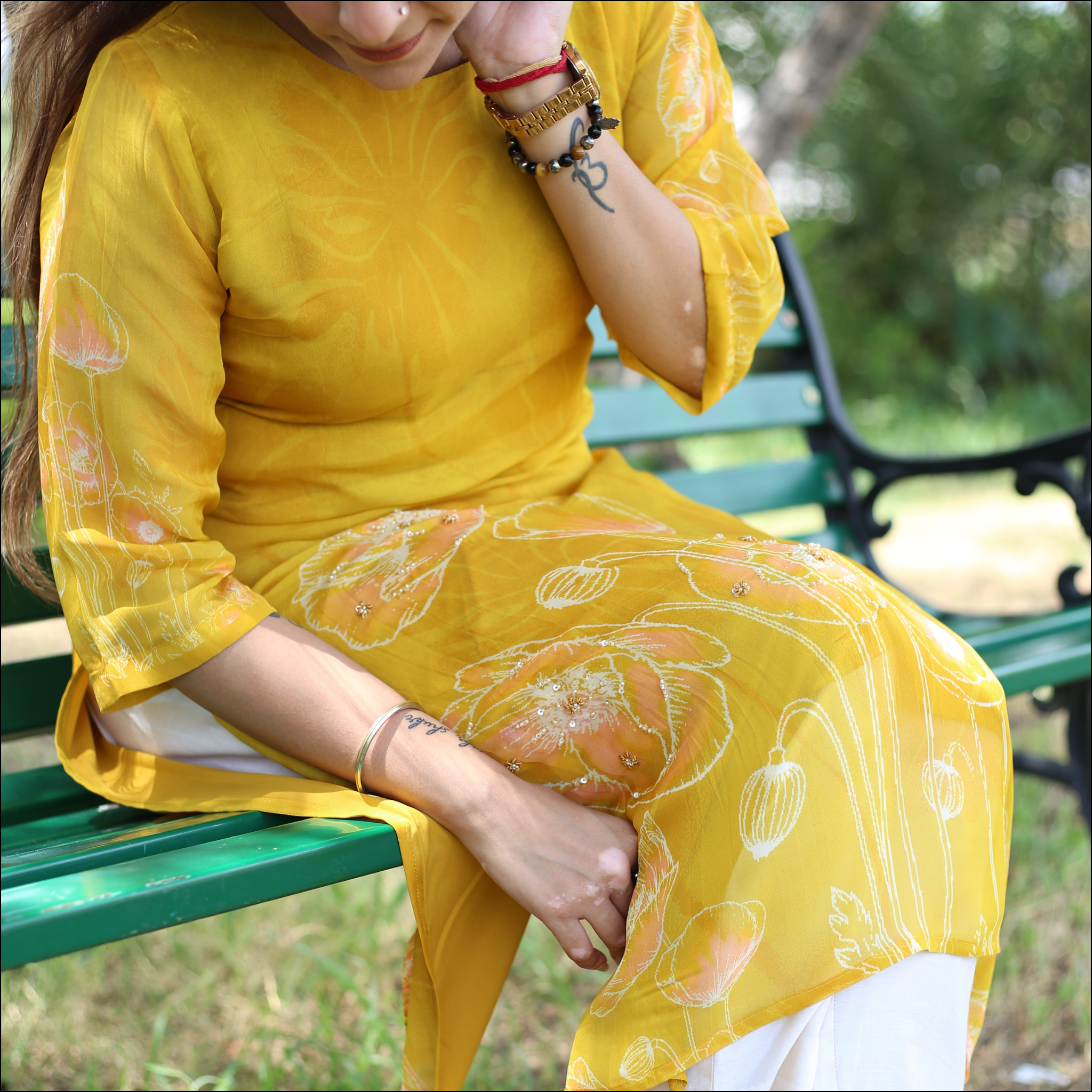 Yellow Organza Kurti with Handwork & Tassel Detailing