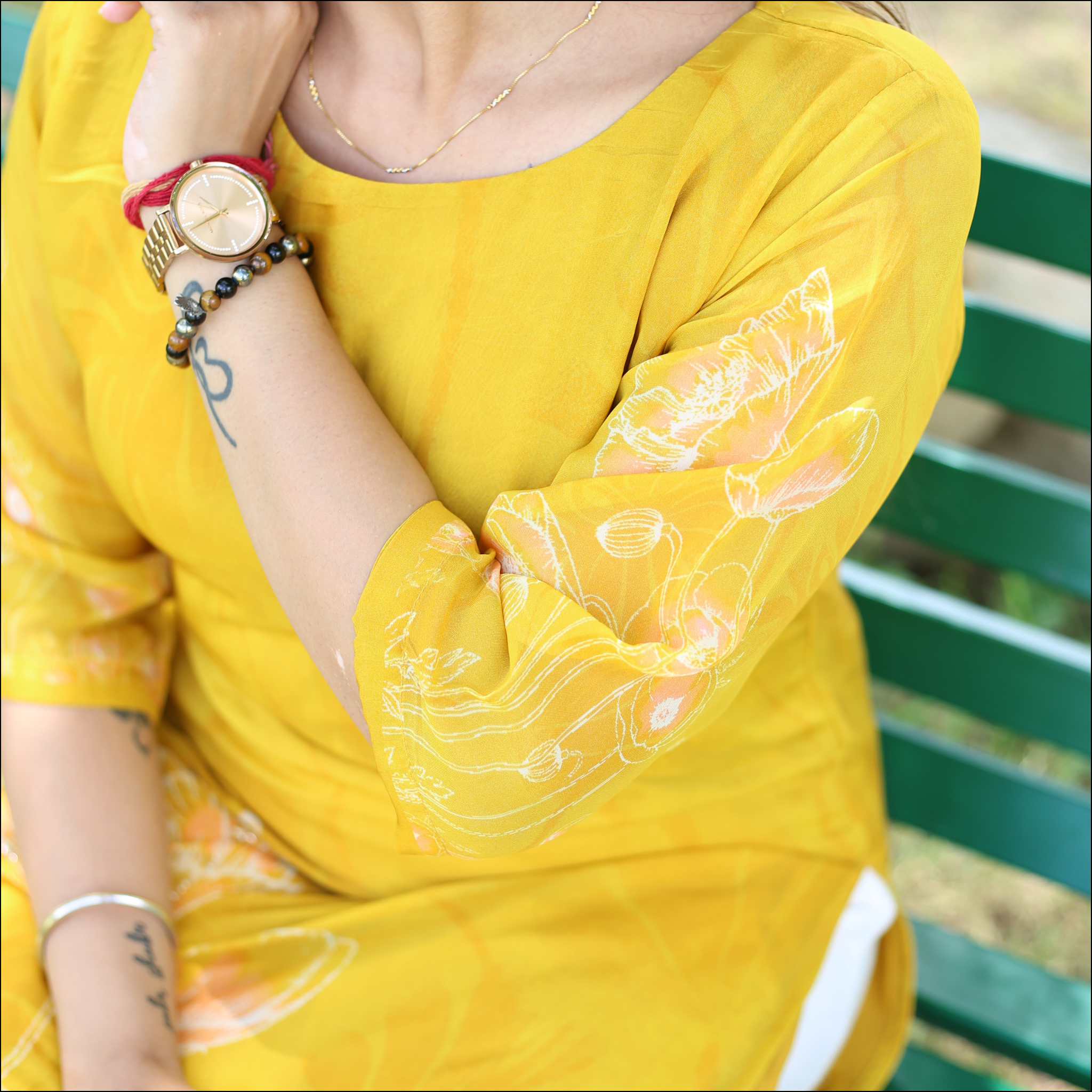 Yellow Organza Kurti with Handwork & Tassel Detailing