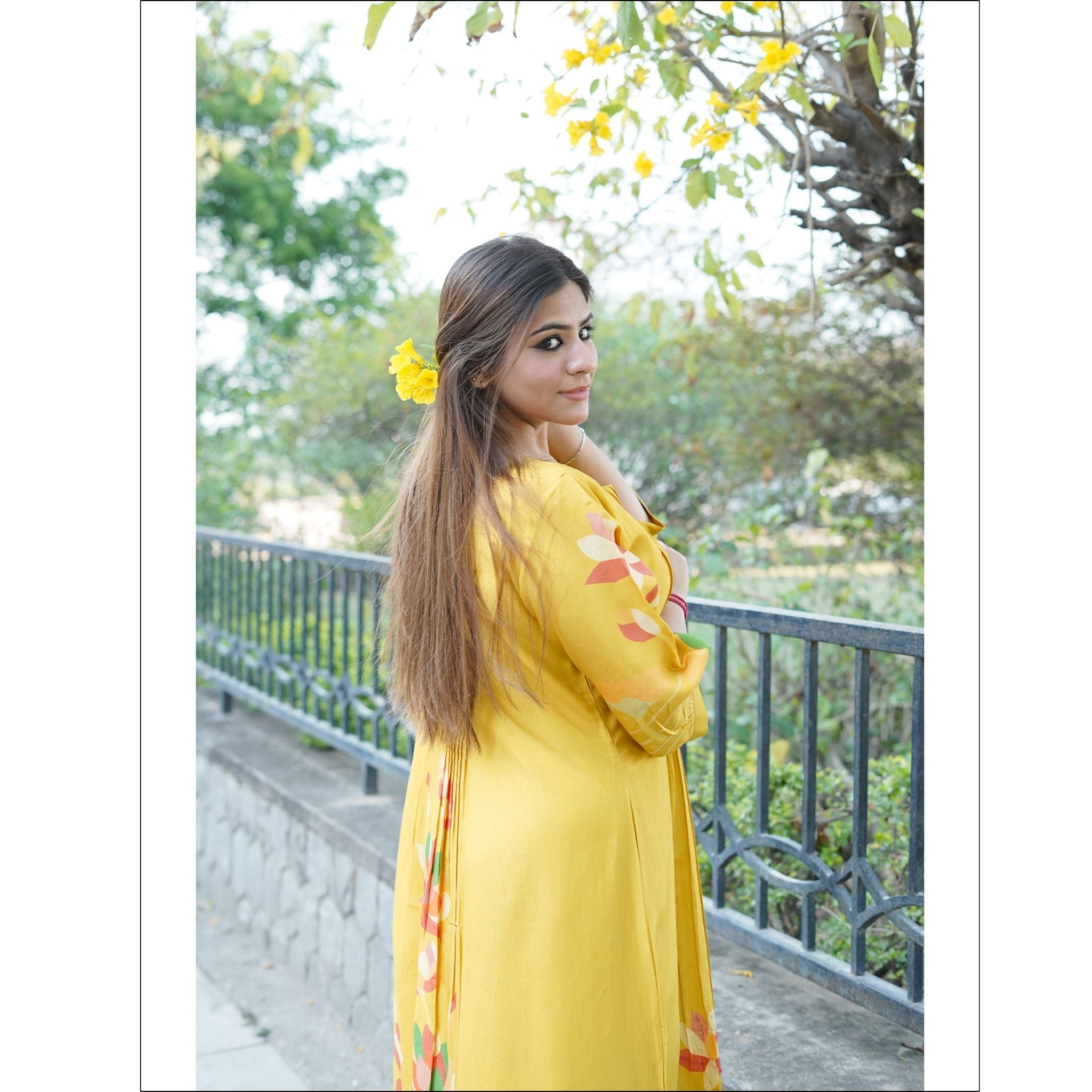 Sunshine Yellow Muslin Kurti with Floral Print & Pleated Design