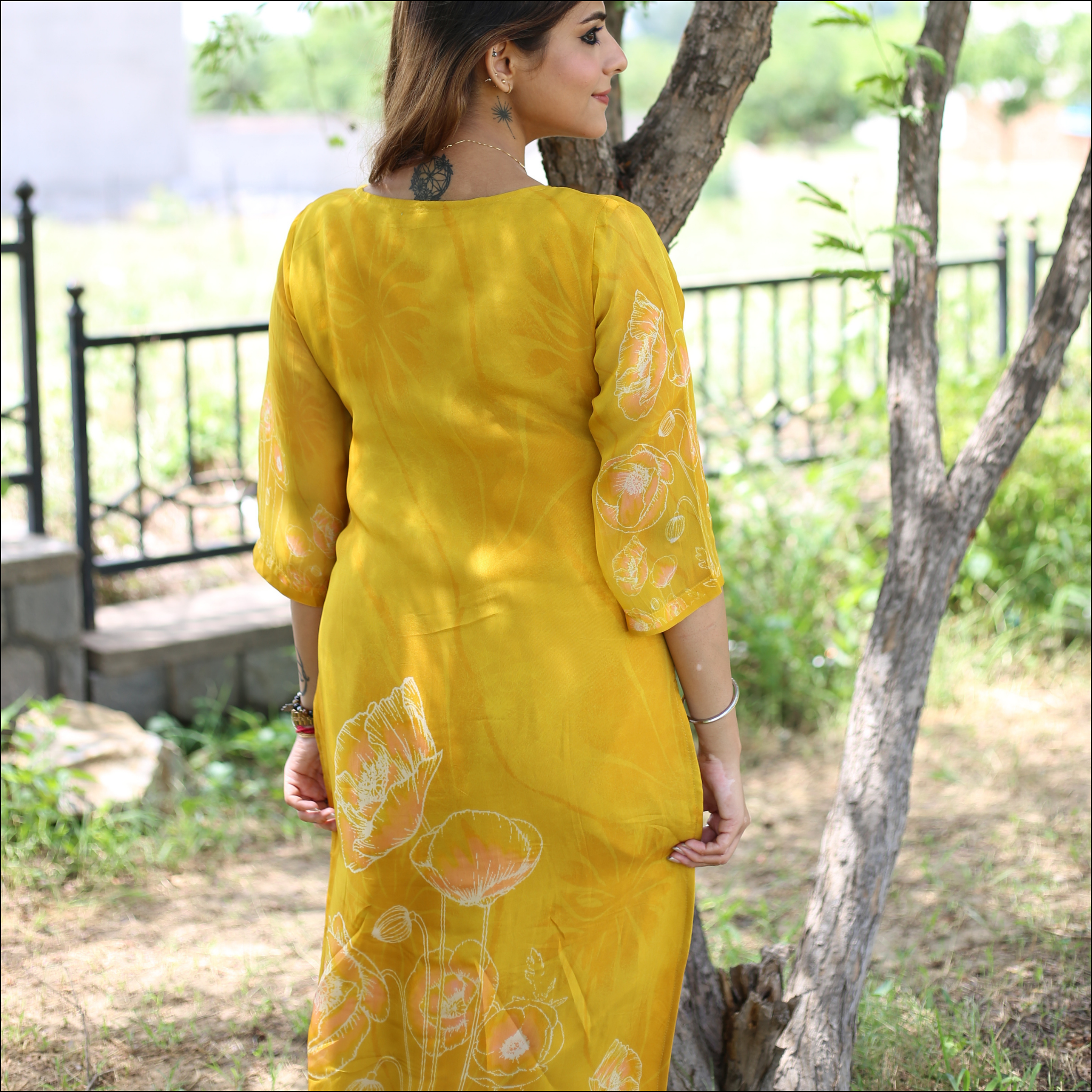 Yellow Organza Kurti with Handwork & Tassel Detailing