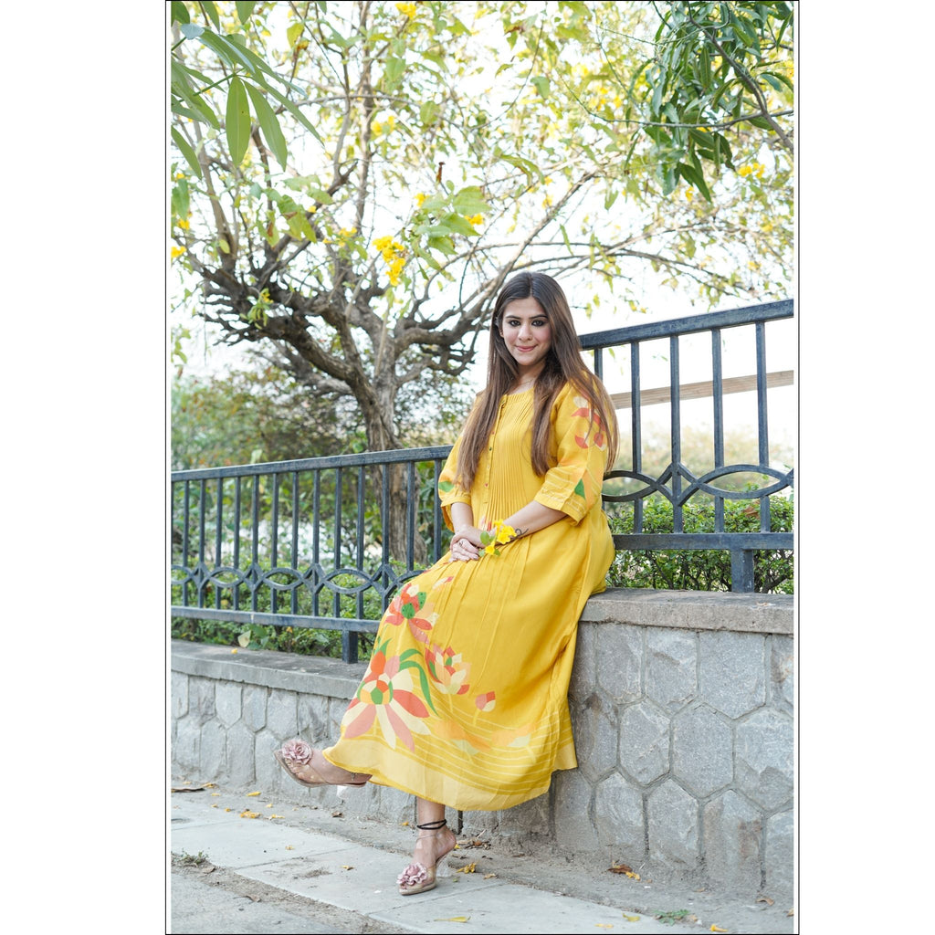 Sunshine Yellow Muslin Kurti with Floral Print & Pleated Design